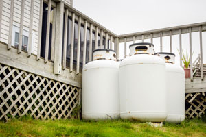 Can I throw away an old propane tank?